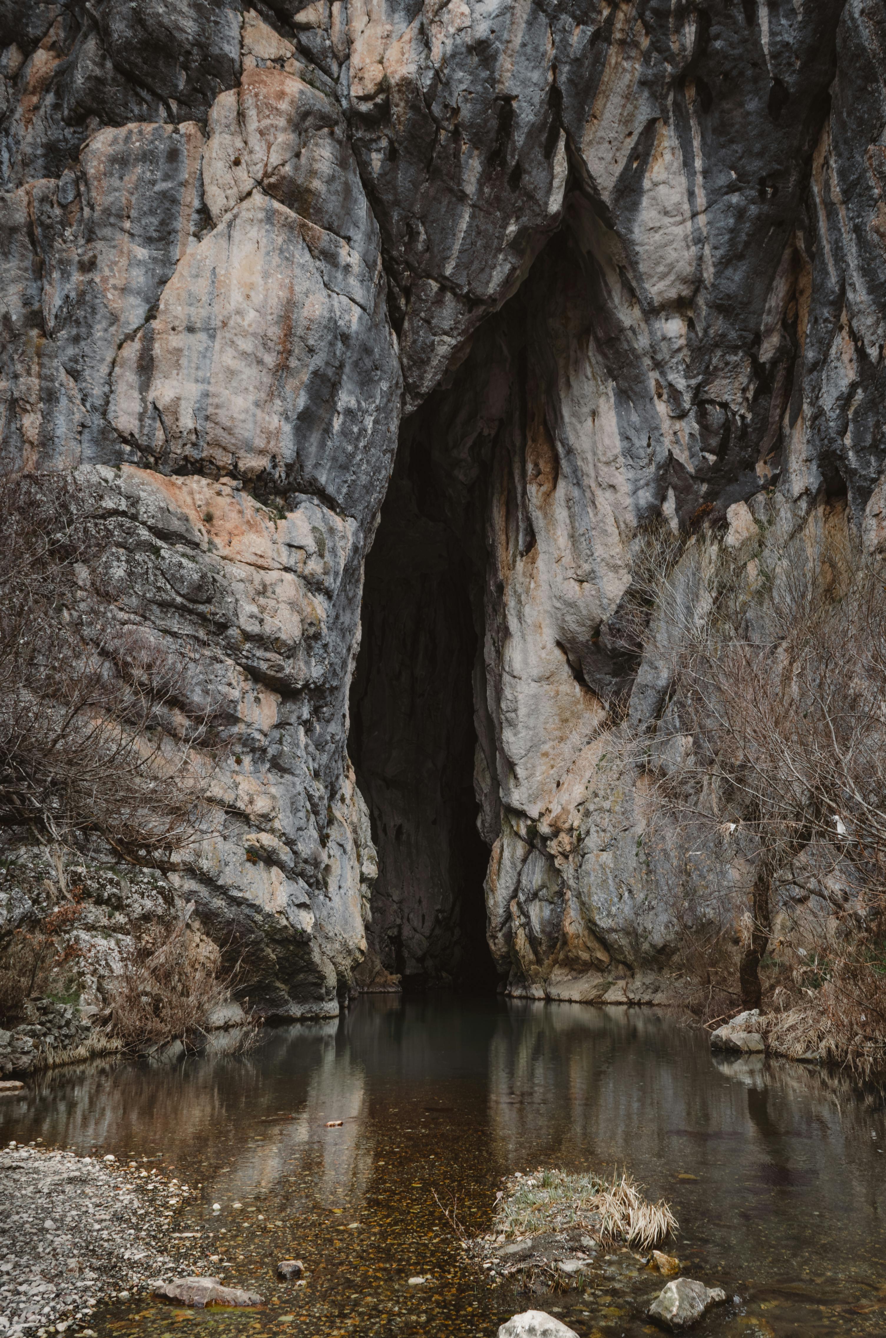 Scenic landscapes, limestone mountains, caves, waterfalls, river views, adventure travel, nature exploration, hidden travel spots, Southeast Asia